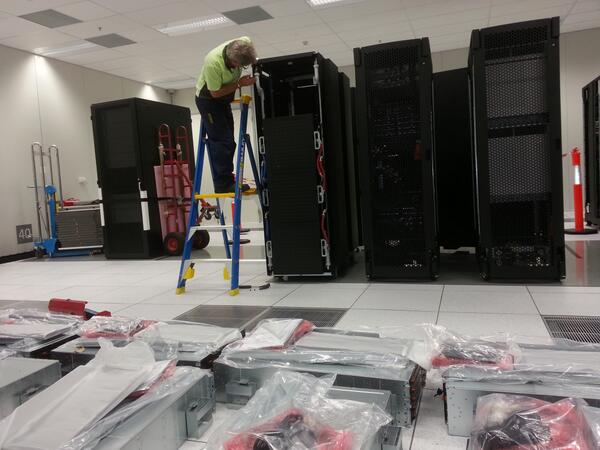 PawseyCentre's tweet photo. @sgi_corp Data analysis cluster &amp; high performance storage environment are starting to look good in #Pawsey I/O Cell http://t.co/crKltFEAEC