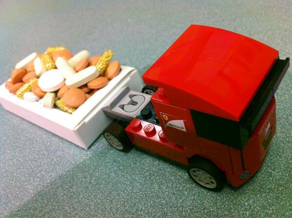 Effected1209's tweet photo. The #shell_lego Scuderia Ferrari Truck hard at work! @Shell_Australia http://t.co/DzF8QIMAx9