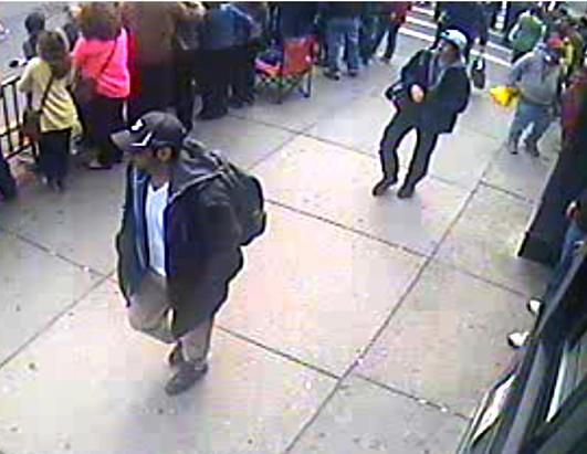 Assurecomm's tweet image. #Dzhokhar Tsarnaev in the Boston Marathon bombing walk near the marathon finish line, April 15 in Boston, Mass.