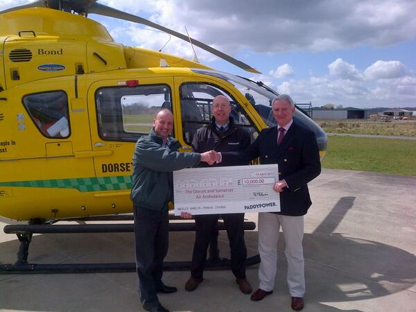 pphorseracing's tweet photo. Anthony Knott presents Bill Sivewright CEO of Dorset and Somerset Air Ambulance with a cheque for 10k this morning http://t.co/VejClUGxYx