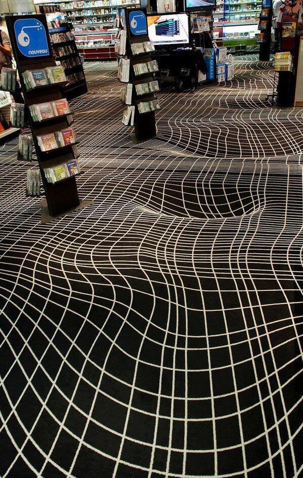 EdenFlamingo's tweet photo. Floor illusion в CD shop. Илюзия? Really? Nah. Казах ви, че извънземните ще дойдат и ще правят вдлъбнатини по пода. http://t.co/3rTsSIIdxQ