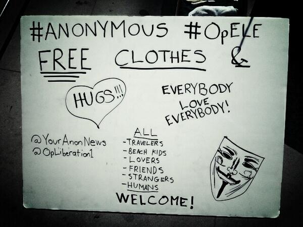 ScarfAnon's tweet photo. @YourAnonNews @opliberation1  the sign @ the clothing drive 4 the homeless in #Venice #OpELE #Stop CISPA #spreadlove http://t.co/ynhTOBIIUx