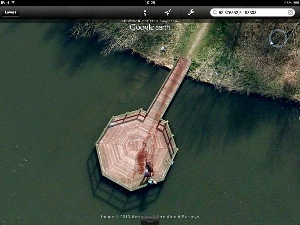 GoogleEarth Fun on X: Guy dragging dead body into lake 52.376552,5.198303  http:t.coJZEwILDDyr  X