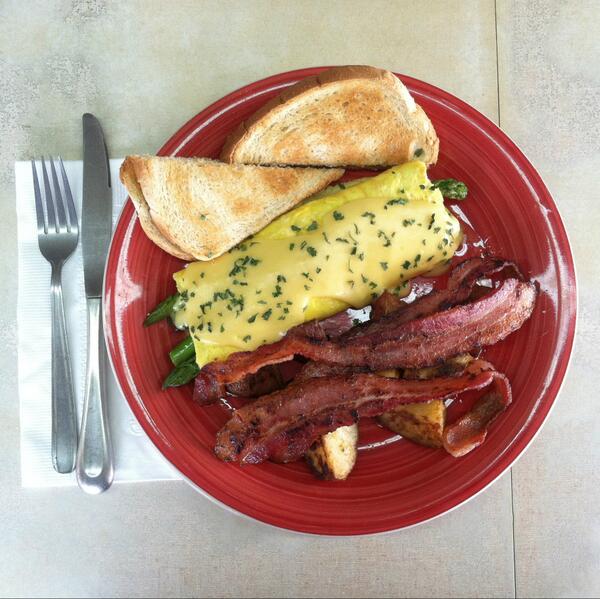 Our delicious, hollandaise topped Asparagus Omelet returns tomorrow!  $7.95