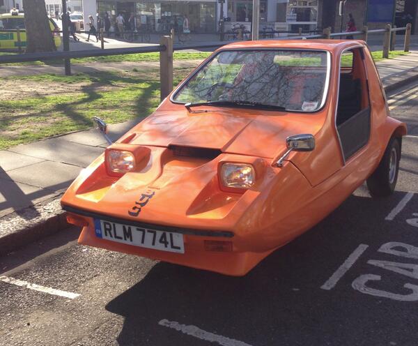 pascalhuser's tweet photo. Spotted in #ParsonsGreen! A Bond Bug microcar with lift-up canopy and side  screens. British made 1970-74. http://t.co/LpNA0BgHnT