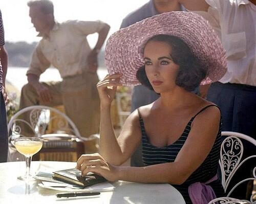Liz Taylor + floppy hat + sun swept veranda = my vacation inspiration, now and forever more. #throwbackthursday