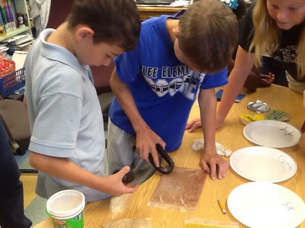 LeeElementary's tweet photo. Trace and Jeremy find iron in their cereal during their science fair project. http://t.co/5Rpo6FX9iV