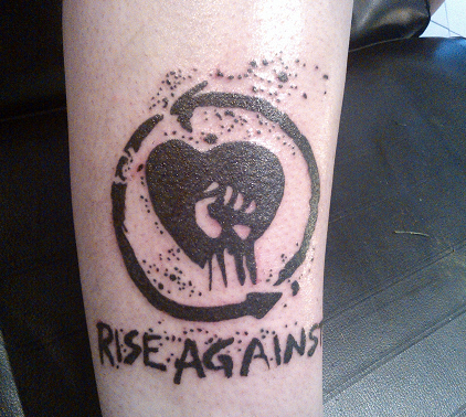 GingeeB_'s tweet photo. 1st TATTOO .....SEXIEST Tattoo to have ever been done xP xxxxxx of @riseagainst And its AWESOME!!! xD xxxxx http://t.co/EoXzGwydJP