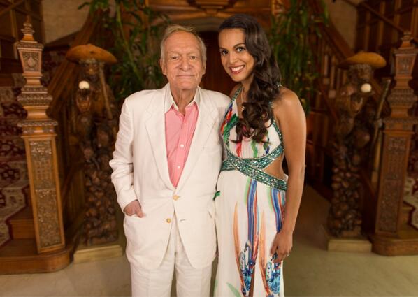 Playboy's tweet photo. .@hughhefner and #pmoy2013 @rpomplun pose in the great hall. Photo: @GettyImages http://t.co/O9UKAUoYO1