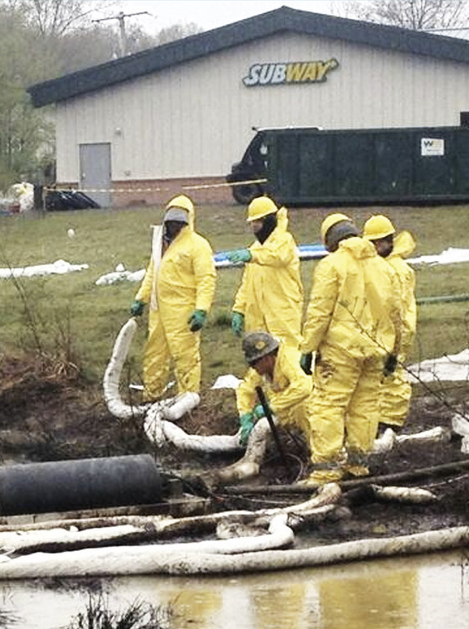 ExxonCares's tweet photo. The best thing about oil pipeline ruptures in a suburb: Easy access to five dollar footlongs! #ExxonCares #EatFresh http://t.co/N2MkxqEGUn