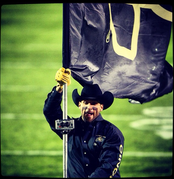 timbe2's tweet photo. Hope @gopro saw this awesome shot of @thejoshal running out the Colorado flag behind Ralphie! #gobuffs http://t.co/Q9oKv4iFdz