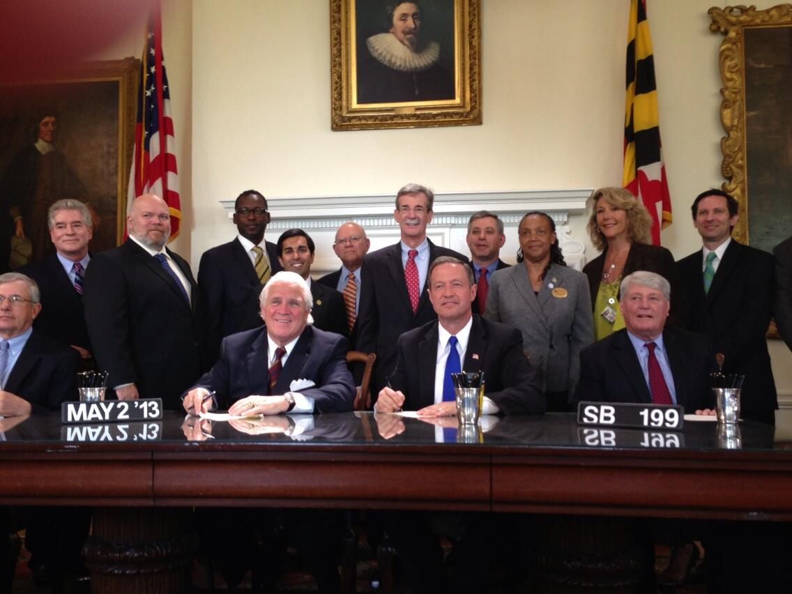 Del. Arora & Sen. Frosh with Advocates & Dist. 19 resident Paul Witting at Mortgage Refinance Bill Signing