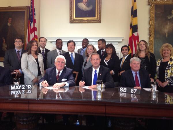 Del. Arora with auto safety advocates at Seat Belt Bill signing