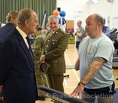 HRH_PrincePhil's tweet photo. This brave man was telling one how he lost his arm fighting the Taliban. Well one thinks he said that or Terry Ban…… http://t.co/BuSi96fxS5