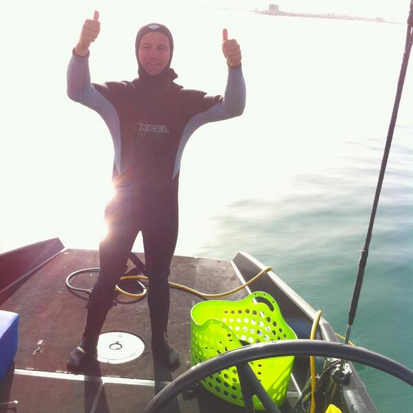 TeamAquaRC44's tweet photo. Morning dive for @DylanClarke85, give the bottom of the boat some love. #TeamAqua #RC44 #SqueakyClean #GimpSuit http://t.co/gk6z5efo4f