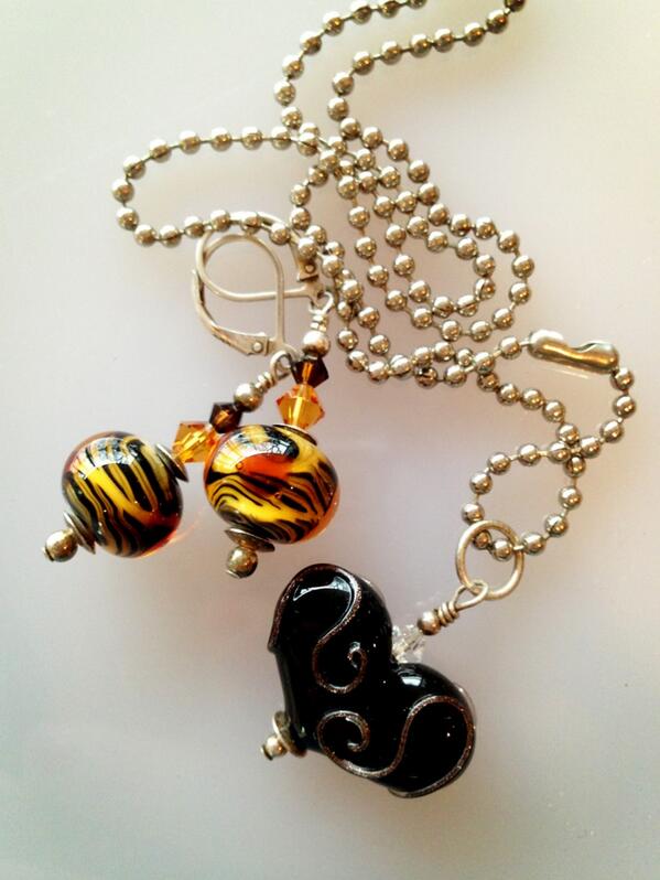 Feeling the heart and tiger earrings today... kariheybrock.com