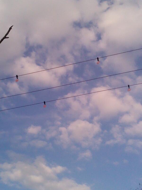 GeekyOT's tweet image. Can anyone tell me what the orange circley things are on this power line? #ignorance #NotATrickQuestion