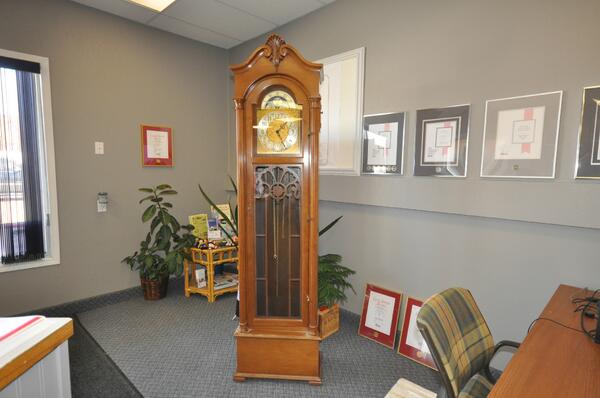 This Hentchel Grandfather Clock. one of the items  National Garage sale for the Royal LePage Shelter Foundation