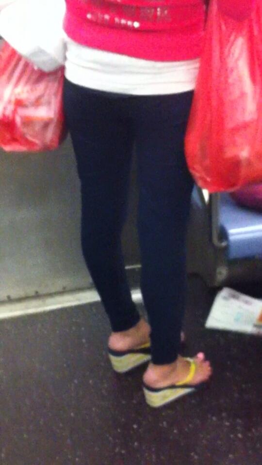drunkelvis's tweet photo. Sexy #feet and #legs subway Asian Hunny 3 @CreepFan @FemaleFeet_ @yogapantsbooty http://t.co/vq8U85n95h