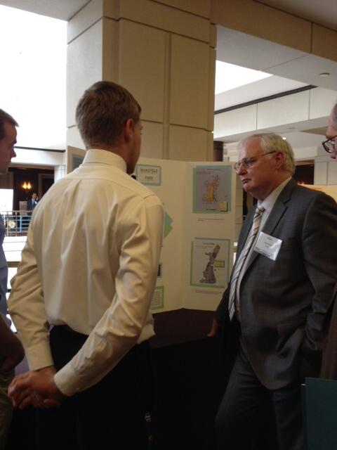 NGA_GEOINT's tweet photo. #DDNGA Rodrigue chats with Centreville HS science fair student winners at #USGIF's Tech Show, May 23. #GCW2013 #CVHS http://t.co/aR5LNoohIQ