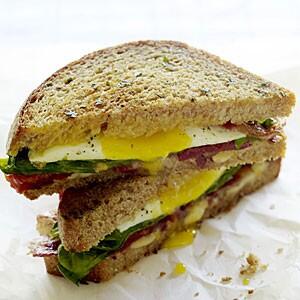 Today's special: California Brunch. Bacon, spinach, tomato, fried eggs, and Gouda on multigrain whole wheat.