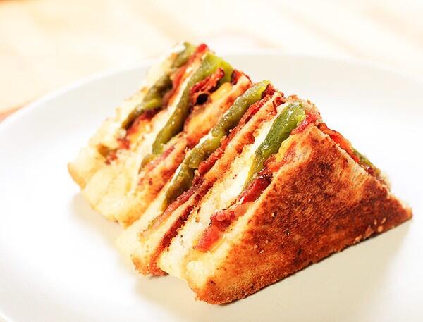 Daily Special: the Jalapeño Popper. Jalapeño poppers, jalapeño Monterey Jack on white.