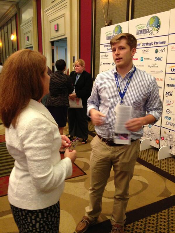 NGA_GEOINT's tweet photo. #DNGA chats with Josh Schecker, a @virginia_tech senior, majoring in #geography, at #USGIF's Tech Show #GCW2013. http://t.co/ciTkuxepyV
