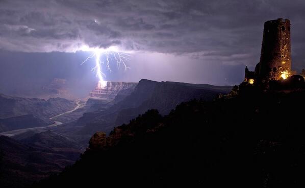 YourWorldFacts's tweet photo. An incredible moment of a fierce lightning bolt crashed against the Grand Canyon illuminating the steep canyon walls! http://t.co/6VWsP48XxM