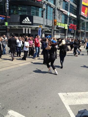 Lara_Pingue's tweet photo. Flash mob at Yonge and Dundas. How retro! http://t.co/9GGxxeUi6X