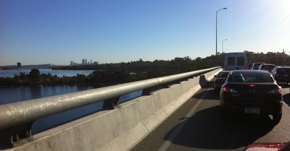 Morning rush-hour traffic on Mt Henry bridge going into Perth business central district.
