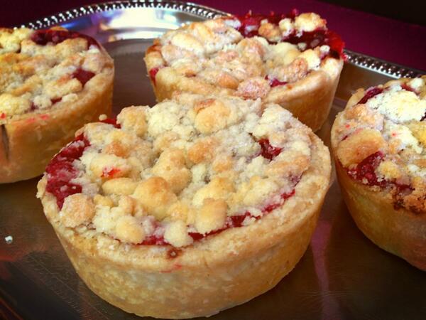 Locally grown rhubarb is in supply! We think it goes quite well with raspberries for a Saturday treat: