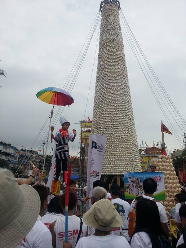 FoodRevHK's tweet photo. Check out our young chef on stilts, representing @FoodRev at #hk's Bun Festival! #frd2013 http://t.co/rAiLuX3D19