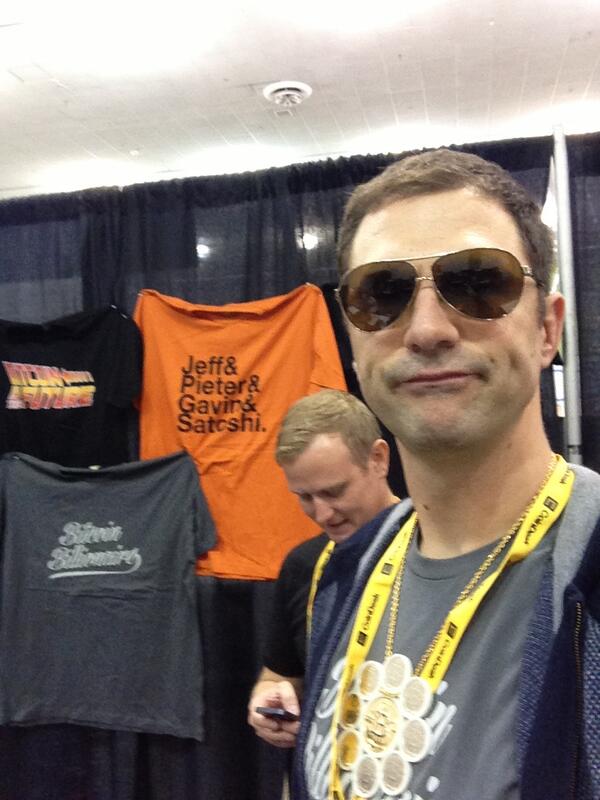 Shirtoshi's tweet image. .@zhoujianfu at the booth #Bitcoin2013 - You can pay for the shirts in BTC, but the duckface is free.