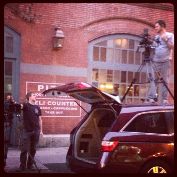 MeghanMcCain's tweet photo. Raising McCain camera man @brianjkerley killing it on top of a car in Little Italy. http://t.co/GBxZdCvKt7