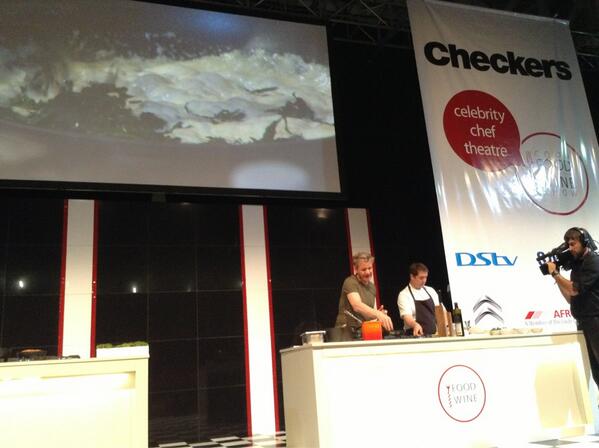 CheckersSA's tweet photo. #GordonRamsay Laying spinach over nutmeg laced cream... #CheckersTheatre #gfws2013 http://t.co/IyvFtBqH6A
