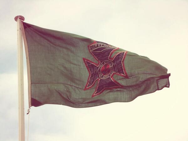 The Kings Royal Rifle Corps flag flies over the Green Jackets Memorial, Calais on Wednesday #Calais1940