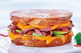 Daily special: the Festival. Pulled pork, apples, caramel, and cheddar on white.