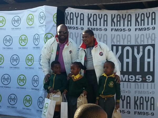KayaON959's tweet photo. @GregMaloka and Tim Tebeila handing out the tracksuits and snacks... #Mvelaphanda #KayaFMWinterCampaign http://t.co/9SPk5MExZ2