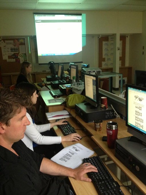 Teachers at Golf Road marking mock EQAO exams using Crowdmark