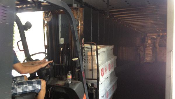 WAFB's tweet photo. Crews load items from Power of 9: Operation #Oklahoma into 18-wheeler for transport to #tornado victims. #helpOK http://t.co/Gy4iNGfhV9