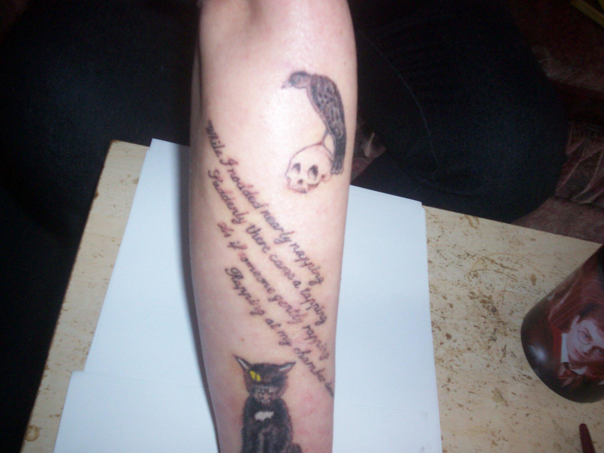 Edgar Allan Poe inspired tattoo on the right upper arm