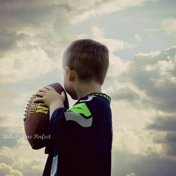 ARitch85's tweet photo. @DangeRussWilson  #BlueFriday Future QB rocking your jersey http://t.co/RWouB1acSN