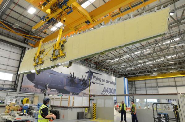 Airbus's tweet photo. Our plant in Filton, UK assembles the wings for the @AirbusMilitary #A400M - here's one of them #Airbus247 http://t.co/sqtrfRCDD5