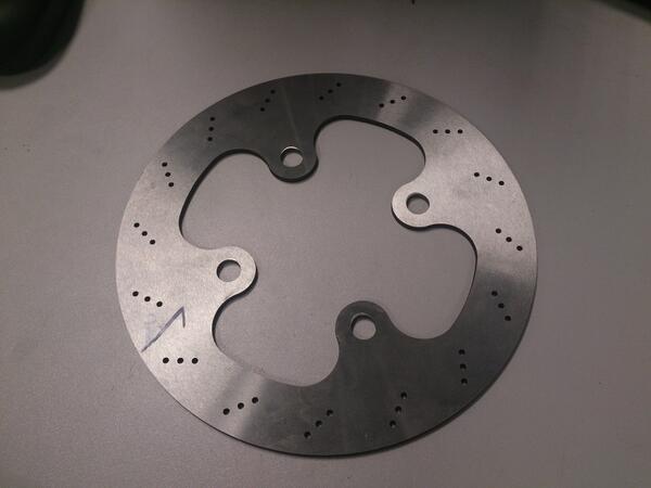 Brake discs arrived this morning. Designed in <a href="/SolidWorks/">SOLIDWORKS</a> and waterjetted from 4mm low nickel stainless steel plate.