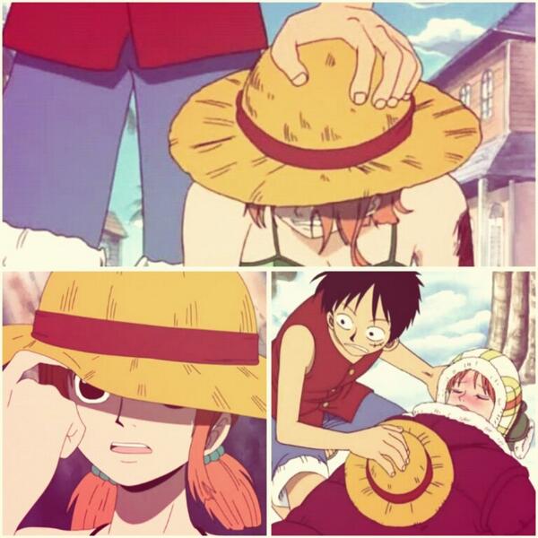 Luffy gives his hat to Nami 