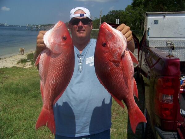 CaptBillWillis's tweet photo. Brad from Kentucky with a couple of today's Snapper. http://t.co/Zgqyig2KD4