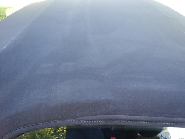 VehicareEK's tweet photo. Faded and worn looking soft top before restoration http://t.co/ivAjc4q2cI