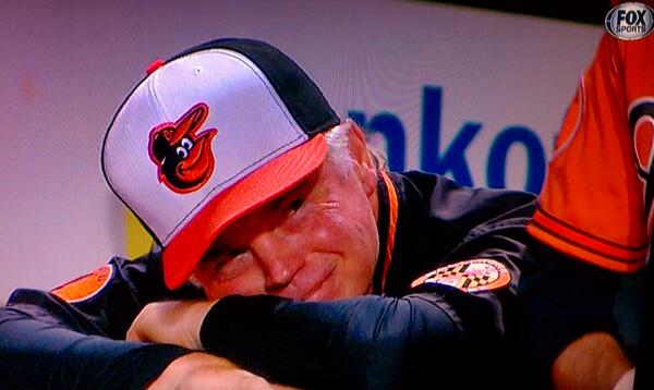 Thyrl's tweet photo. You can try to hide it but we see you Buck Showalter. #AintTheBeerCold #Orioles http://t.co/GVGmpROB4L