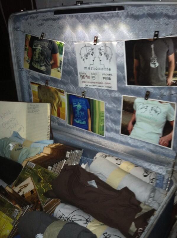 RVAbands's tweet photo. @marionettemusic hooked it up with some free music! Big ups on the sweet #suitcase merch display! #rva http://t.co/V6eo20sasZ