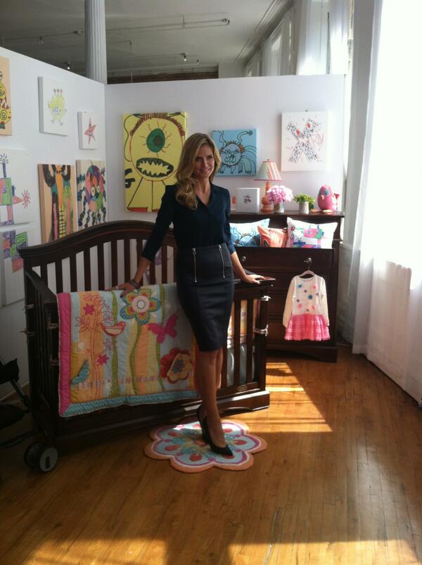 heidiklum's tweet photo. So proud! RT @HouseBeautiful: Heidi at @Shutterfly event. Artwork behind her was created by her kids! #SFLbydesign http://t.co/P5I3KwuztW
